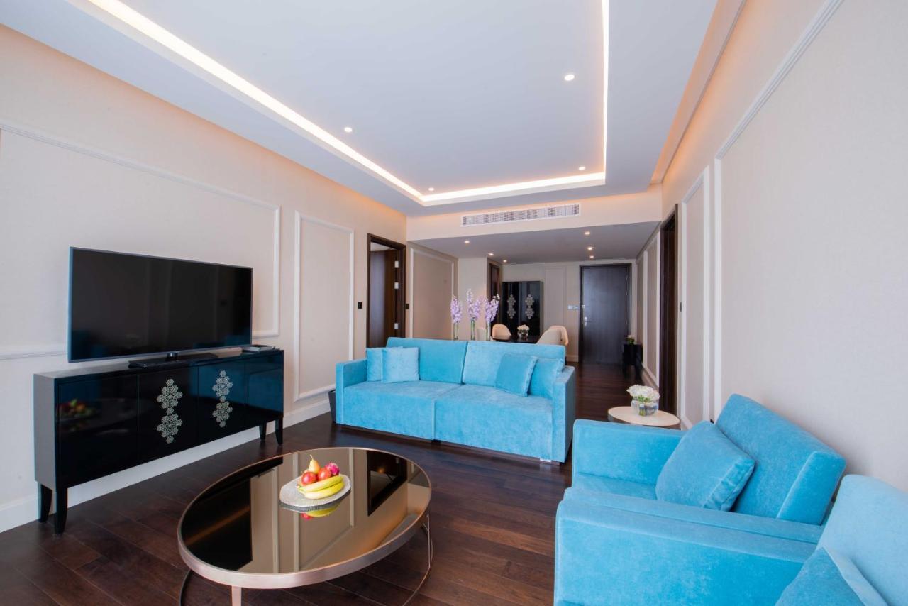 Отель Shaza Доха Экстерьер фото A living room at the hotel